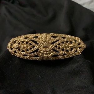 Vintage gold tone brooch